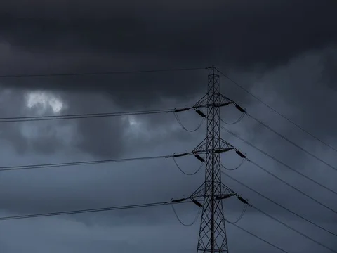 Timelapse of Dark Sky Behind Pylon Stock Footage