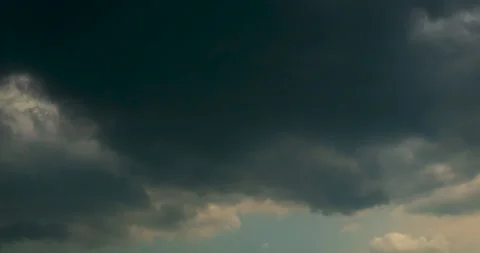 Timelapse dark storm clouds dramatic black sky background. Dark clouds before th 스톡 동영상 229595445