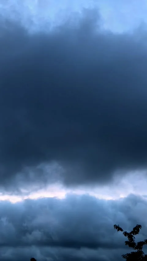 Timelapse of Dark Storm Clouds Moving Fast Across Twilight Sky Stock Footage 341007668