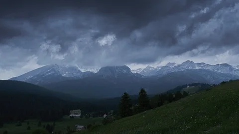 Timelapse of dark storm clouds passing by rocky mountains range in Durmitor Stock Footage 101108232