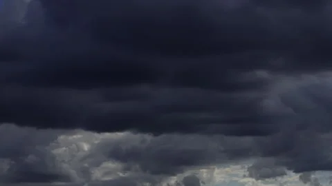 Timelapse of dark storm clouds rapidly forming and moving across the sky. Stock Footage 336904504