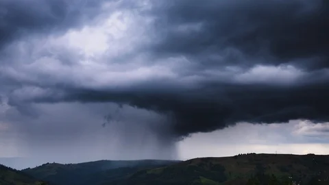 Timelapse of dark storm clouds rolling in the sky during rain storm Stock Footage 115409416