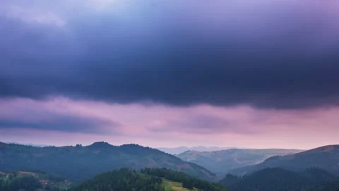 Timelapse of dark storm clouds rolling in the sky over the mountains landscape Stock Footage 153902455