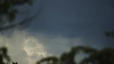 Timelapse of dark storm clouds rolling in and gathering in the sky. Grey cl.. Stock Footage 336181689