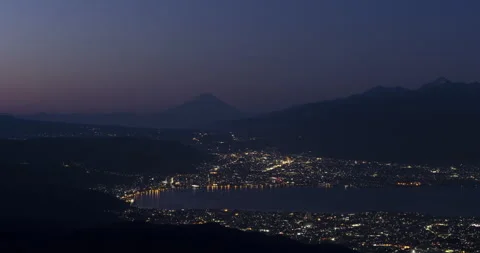 TimeLapse - Dawn of Mt. Fuji and Lake Suwa seen from Takabocchi Plateau Stock Footage 152999258