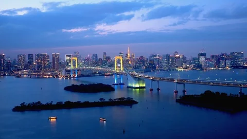 TimeLapse - Daytime to night scenery in Tokyo and Tokyo bay - Tilt down Stock Footage 99705460