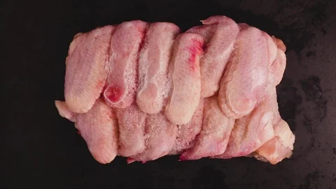 Timelapse defrosting packing of chicken wings Stock Footage 73593254