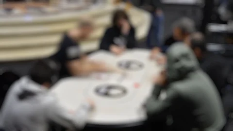 Timelapse of deliberately blurred texas hold 'em poker tournament Stock Footage 100089902