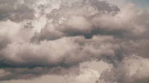 Timelapse of dense grey storm clouds moving across the sky Stock Footage 313013511