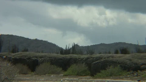 Timelapse of desert with clouds passing by colorgraded Stock Footage 77630136