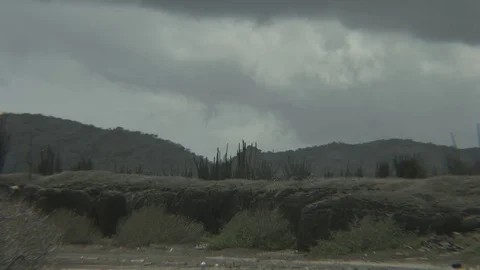 Timelapse of desert with clouds passing by Video stock 77630162