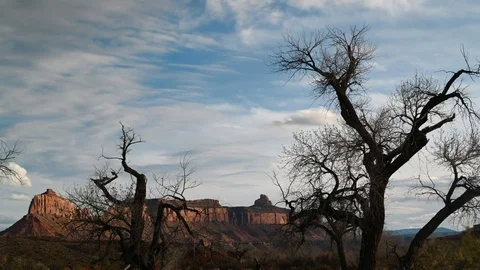 Timelapse - Desert Landscape, mesas, clouds, trees Stock Footage 107280930
