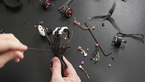 Timelapse of disassembly of a broken quadcopter Stock Footage 149758953