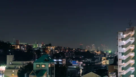 Timelapse of Distant Skyline at Night in Tokyo  動画素材 92486060