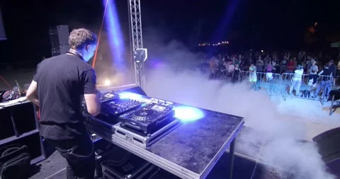 Timelapse of a dj playing at a party at night Stock Footage 188030892