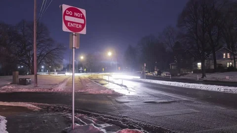 Timelapse of a Do Not Enter Street Sign at Night Video stock 85575105