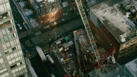 Timelapse Down Shot Intersection with construction site and crane. Stock Footage 101409526