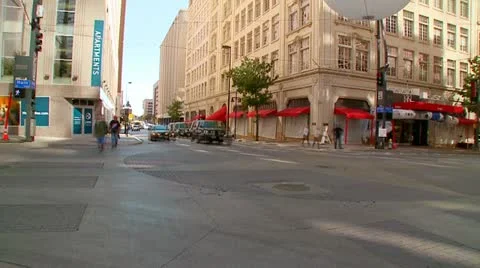 TIMELAPSE DOWNTOWN INTERSECTION WITH PEOPLE Stock Footage 12536548