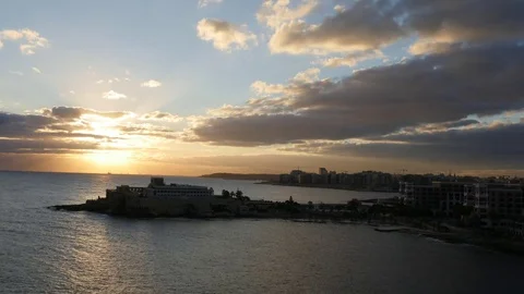 Timelapse of Dragonara Point, Sliema and the Malta coast stretching to Valletta Video stock 82168196
