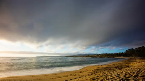 Timelapse - Dramatic and colorful Seascape at a California Beach Stock Footage 234835166