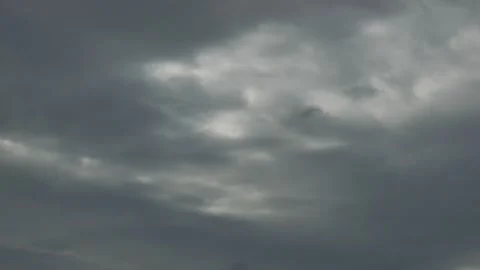 Timelapse of dramatic clouds moving across moody sky Video stock 317826227