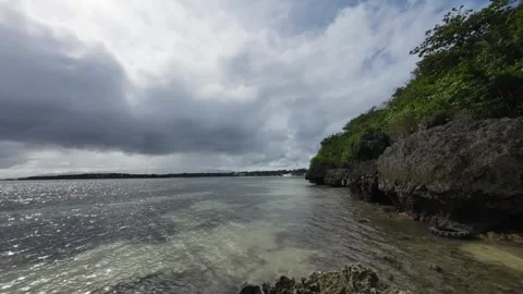 Timelapse Dramatic Clouds Over Boracay Philippines With Rocky Coast Foreground Stock Footage 333670636