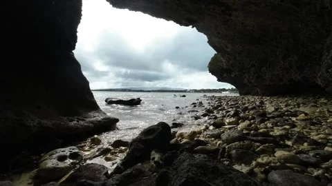Timelapse Dramatic Clouds Over Boracay Philippines With Rocky Cave Foreground Stock Footage 333672272