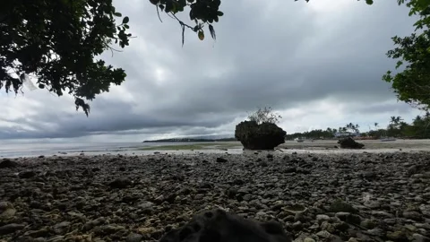 Timelapse Dramatic Clouds Over Boracay Philippines With Rocky Coast Foreground Stock Footage 333672842