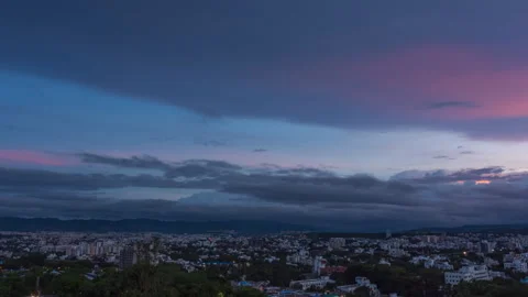 Timelapse - Dramatic clouds over a city on a clear day 4K60 Stock Footage 271199262