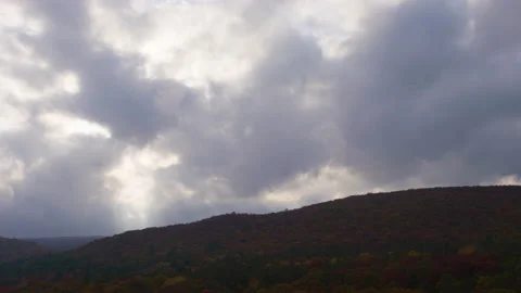 Timelapse of dramatic clouds over rolling hills just outside Port Jervis NY Stock Footage 142087349
