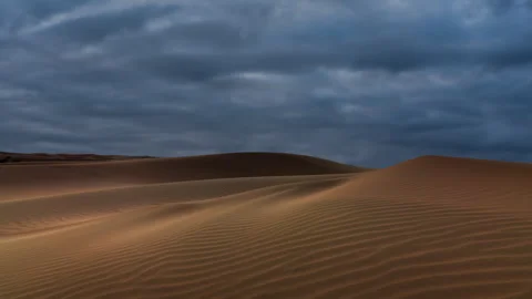 Timelapse of dramatic clouds over the sand dunes in the desert. Sahara desert Stock Footage 265166205