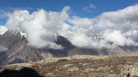 Timelapse of Dramatic Clouds Swirling Around Snow-Capped Mount Namcha Barwa, 動画素材 337599342
