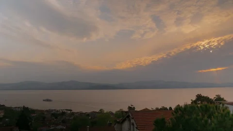 Timelapse: dramatic cloudy sunrise sky with the rising sun over Istanbul Stock Footage 340449438