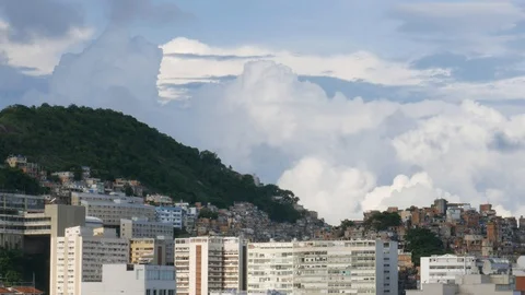 Timelapse of dramatic cumulus clouds above Cantagalo / Pavao Pavaozinho favela Stock Footage 104712136
