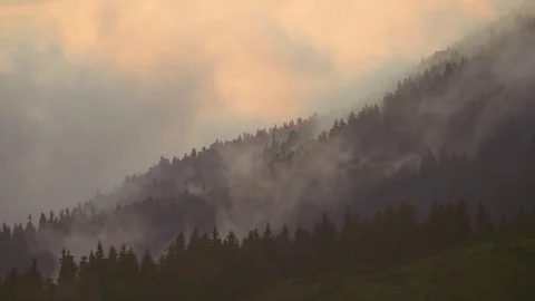 Timelapse of dramatic mountain scenery with clouds and sun rays. Aerial view of 스톡 동영상 114316513