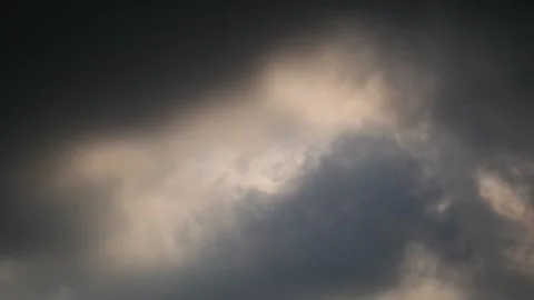 Timelapse of dramatic movement of dark clouds covering the sky Stock Footage 290503410