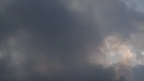 Timelapse of dramatic movement of dark clouds covering the sky Stock Footage 290503513