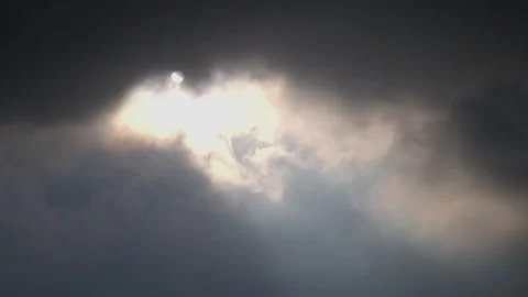 Timelapse of dramatic movement of dark clouds covering the sun  #2 Video stock 290504727