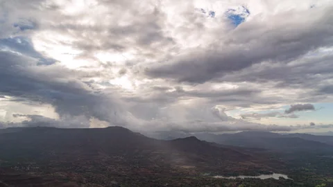 Timelapse - Dramatic rainy clouds moving over a mountain 4K60 Stock Footage 270140676