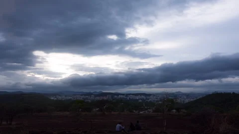 Timelapse - Dramatic rainy clouds over a city 4K30 Stock Footage 271199337
