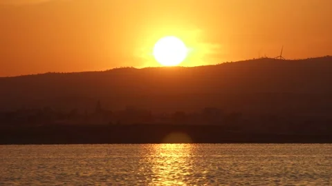 Timelapse of dramatic red sunset on lake. Romantic relaxing scene. Magnificent Stock Footage 130731266