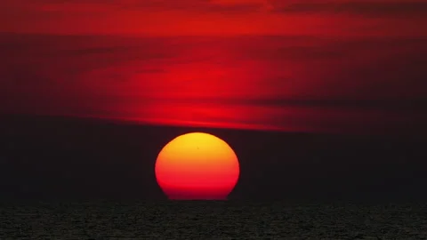 Timelapse of dramatic red sunset over ocean horizon in Phuket Stock Footage 335543465