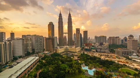 Timelapse of dramatic sunset over KLCC Park. Motion Pan Right Video stock 59941213