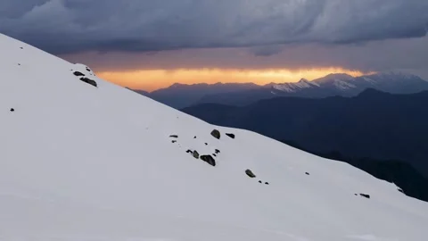 Timelapse of Dramatic Sunset Over Snow Covered Himalayan Peaks With Storm C.. Stock Footage 345368652