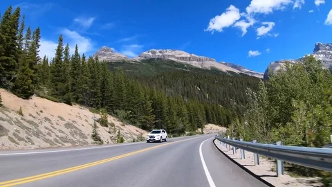 Timelapse drive through the rocky mountains summer Video stock 114885933