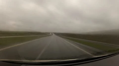 Timelapse driving a car in the rain. Stock Footage 12337939