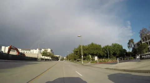 Timelapse Driving past Pasadena City Hall with Rainbow Stock Footage 64952374