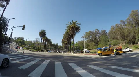 Timelapse Driving on Stadium Way with Low Rider Cars Stock Footage 64948677