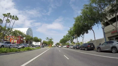 Timelapse Driving Sunset Blvd and up into Hollywood Hills Stock Footage 65173847
