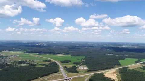 Timelapse from a drone flying over forest expanses and landscapes on a sunny day Stock Footage 167368773